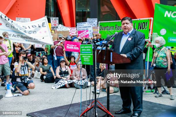 Governor J. B. Pritzker of Illinois speaks to the crowd at an abortion rights rally on June 24, 2022 in Chicago, Illinois. Crowds gathered to protest...