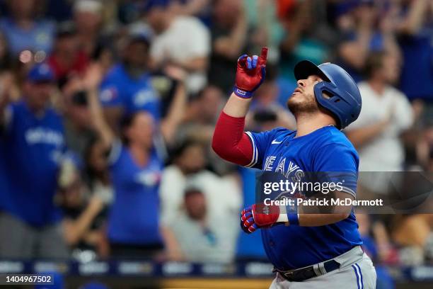 Alejandro Kirk of the Toronto Blue Jays celebrates after hitting a two-run home run against the Milwaukee Brewers in the seventh inning at American...