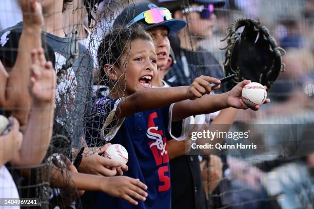 Chicago White Sox fans yells at players for autographs before the game against the Baltimore Orioles at Guaranteed Rate Field on June 24, 2022 in...