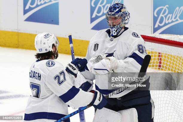 Ryan McDonagh and Andrei Vasilevskiy of the Tampa Bay Lightning celebrate a win over the Colorado Avalanche in Game Five of the 2022 NHL Stanley Cup...