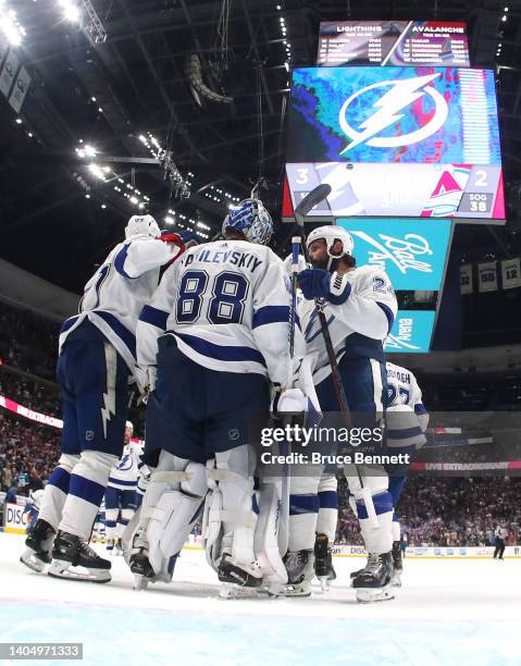 Andrei Vasilevskiy of the Tampa Bay Lightning celebrates with teammates after a win over the Colorado Avalanche in Game Five of the 2022 NHL Stanley...