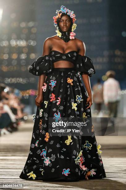 Model walks the runway at the MADE New York 2022 New Wave New York show at Brooklyn Bridge Park on June 24, 2022 in New York City.