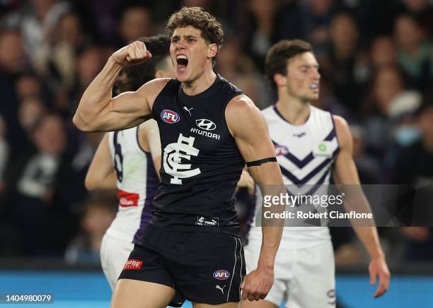 Charlie Curnow of the Blues celebrates after scoring a goal during the round 15 AFL match between the Carlton Blues and the Fremantle Dockers at...