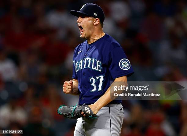 Paul Sewald of the Seattle Mariners celebrates a 4-3 win against the Los Angeles Angels in the ninth inning at Angel Stadium of Anaheim on June 24,...