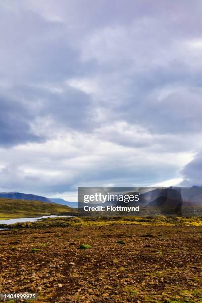 vatnaleid (route 56) takes you through the heath of snaefellsnesfjallgardur, in iceland. part way along the road, the river fossa flows into a series of lakes - fossa river stock pictures, royalty-free photos & images