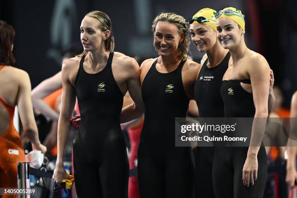 Madison Wilson, Brianna Throssell, Jenna Strauch and Kaylee McKeown of Team Australia react after competing in the Women's 4x100m Medley Relay Heats...