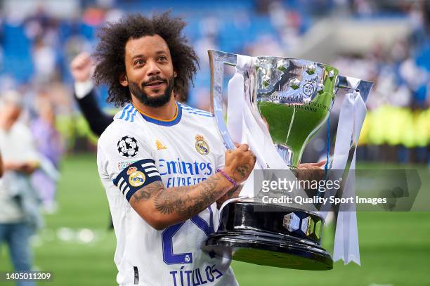 Marcelo Vieira of Real Madrid CF celebrates with the trophy after the LaLiga Santander match between Real Madrid CF and RCD Espanyol at Estadio...