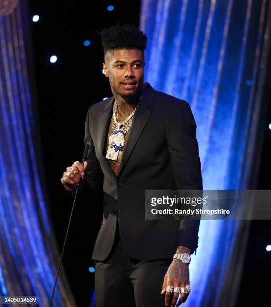 Blueface speaks on stage during the 2nd annual Hollywood Unlocked Impact Awards at The Beverly Hilton on June 24, 2022 in Beverly Hills, California.