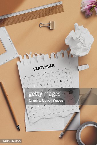 September calendar in female desk