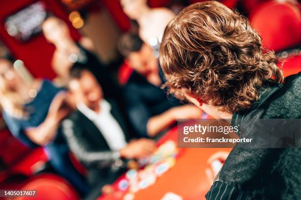 kisses by the luck at poker casino - roulette stock pictures, royalty-free photos & images