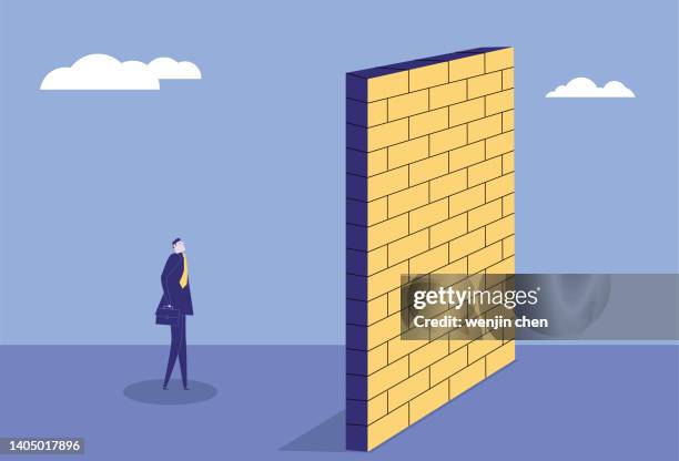 a wall blocks the way for a business man - hurdle stock illustrations