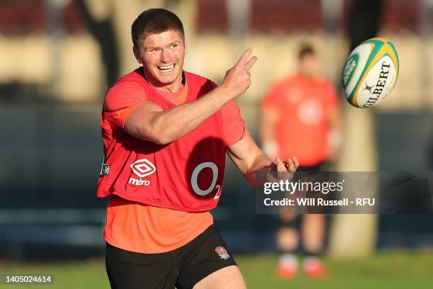 Owen Farrell of the England Rugby squad prepares to pass the ball during an England training session at Hale School on June 25, 2022 in Perth,...