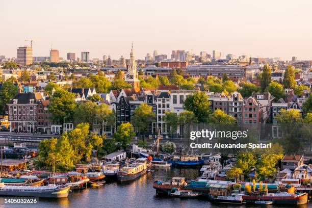 aerial view of amsterdam skyline on a sunny summer day, netherlands - netherlands sunset foto e immagini stock