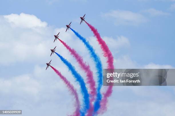 The RAF Red Arrows perform during the Armed Forces Day National Event 2022 on June 25, 2022 in Scarborough, England. Armed Forces Day is an annual...