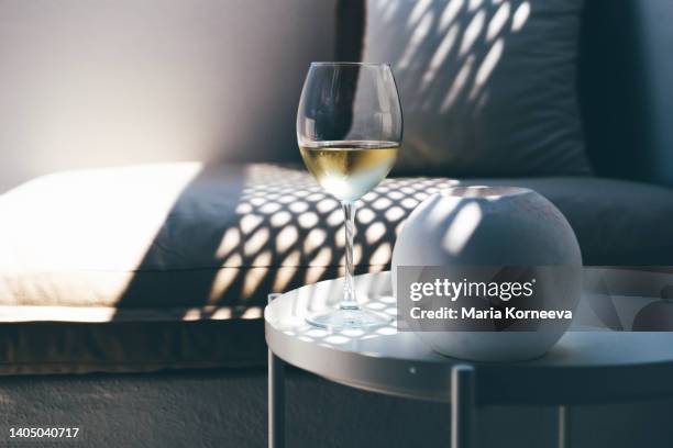 summer terrace with sea view. glasses of wine on a balcony. - balcony decoration stock pictures, royalty-free photos & images