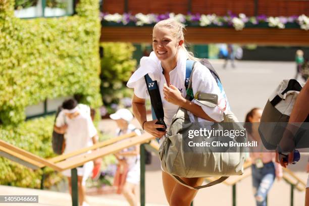 Katie Swan of Great Britain walks back to the locker rooms following their training session ahead of The Championships Wimbledon 2022 at All England...