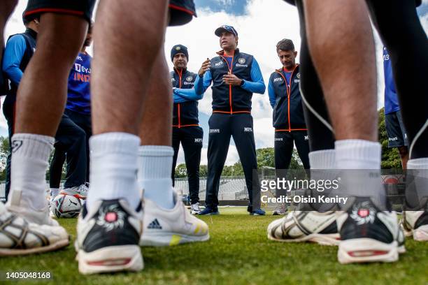Laxman, Interim head coach of India talks to the team in the huddle during training at Malahide Cricket Club on June 25, 2022 in Dublin, Ireland.
