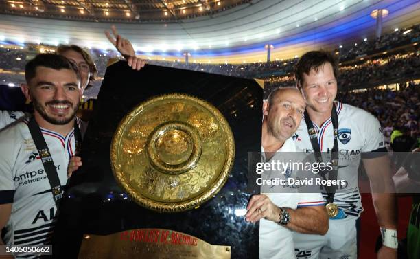 Anthony Bouthier Philippe Saint Andre, the Montpellier head coach and Nico Janse van Rensburg of Montpellier celebrate after their victory during the...