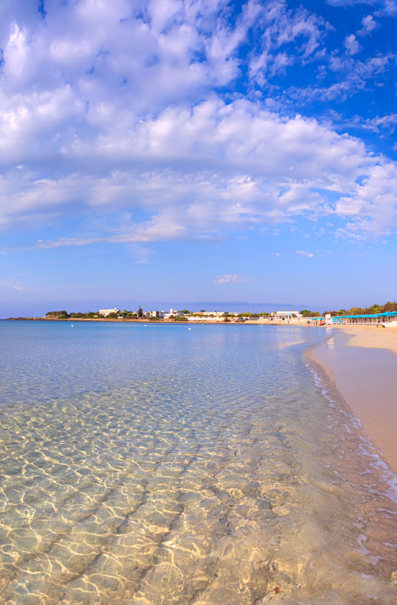 The most beautiful beaches of Apulia, Italy: on the border between the provinces of Lecce and Taranto, Punta Prosciutto Beach is a stretch of Salento coast, part of the Municipality of Porto Cesareo. The most beautiful beaches of Apulia, Italy: on the border between the provinces of Lecce and Taranto, Punta Prosciutto Beach is a stretch of Salento coast, part of the Municipality of Porto Cesareo.