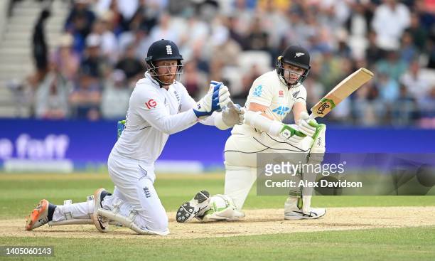 Tom Latham of New Zealand hits runs past a diving England wicketkeeper Jonny Bairstow during Day Three of the Third LV= Insurance Test Match at...