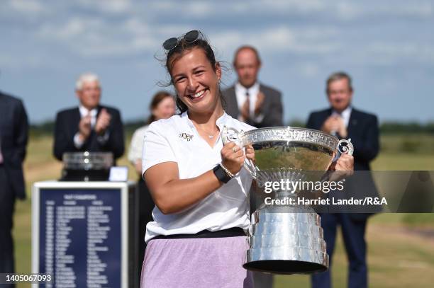 Jessica Baker of Gosforth Park Ladies celebrates with the Women's Amateur Championship Trophy following her victory in the final between Louise...