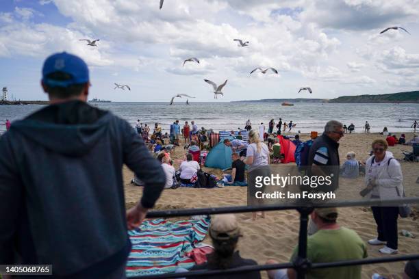 Sea gulls dive bomb beachgoers as they attend the Armed Forces Day National Event at Scarborough on June 25, 2022 in Scarborough, England. Armed...
