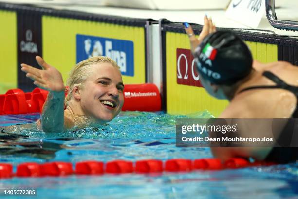 Ruta Meilutyte of Team Lithuania celebrates after picking up Gold with Benedetta Pilato of Team Italy after the Women's 50m Breaststroke Final on day...