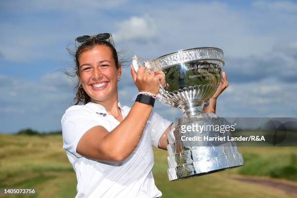 Jessica Baker of Gosforth Park Ladies celebrates with the Women's Amateur Championship Trophy following her victory in the final between Louise...