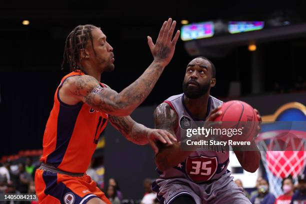 DaJuan Summers of the Tri-State shoots against Michael Beasley of 3's Company during BIG3 Week Two at Credit Union 1 Arena on June 25, 2022 in...