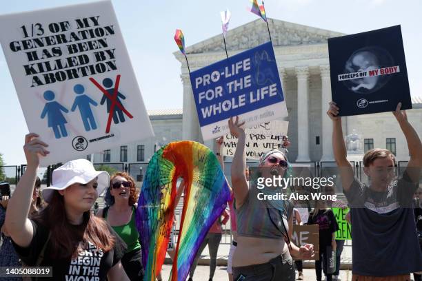 Abortion-rights activists and anti-abortion activists gather in front of the U.S. Supreme Court on June 25, 2022 in Washington, DC. The Supreme...