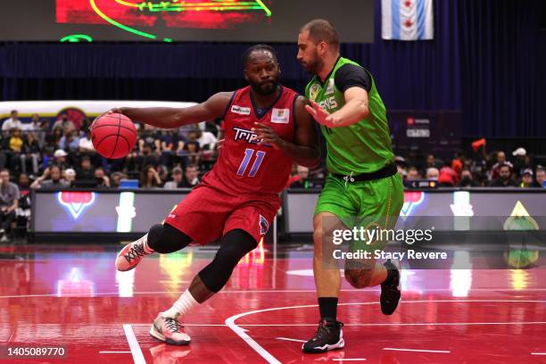 Jeremy Pargo of the Triplets dribbles against Dusan Bulut of the Aliens during BIG3 Week Two at Credit Union 1 Arena on June 25, 2022 in Chicago,...