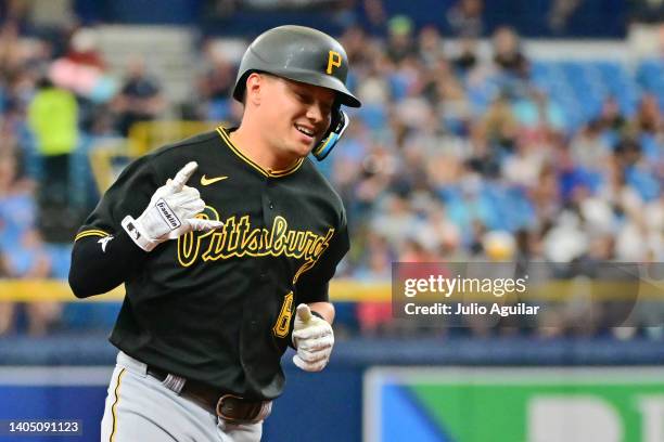 Diego Castillo of the Pittsburgh Pirates gestures to the dugout after hitting a home run in the third inning against the Tampa Bay Rays at Tropicana...