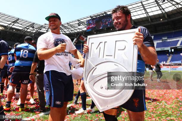 Wilton Rebolo of Rugby New York and Peter Reyes celebrate with the MLR Shield following the victory against the Seattle Seawolves in the Major League...