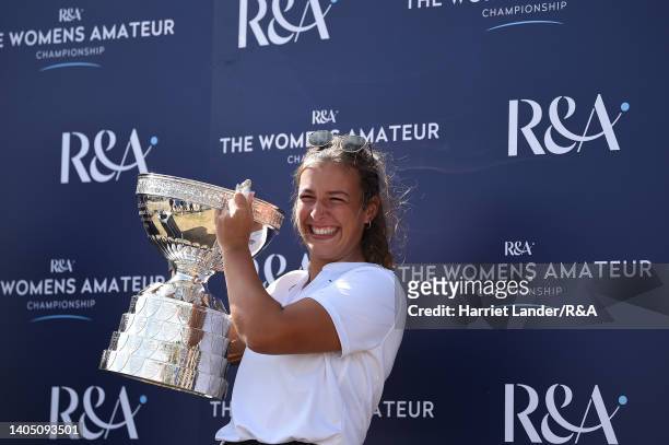 Jessica Baker of Gosforth Park Ladies celebrates with the Women's Amateur Championship Trophy following her victory in the final between Louise...