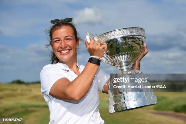 Jessica Baker of Gosforth Park Ladies celebrates with the Women's Amateur Championship Trophy following her victory in the final between Louise...