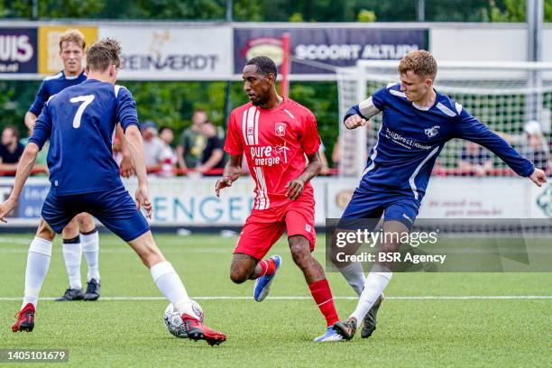 Joshua Brenet of FC Twente, Milan Bultman of Bon Boys during the Preseason Friendly Match match between Bon Boys and FC Twente at Sportpark De Greune...