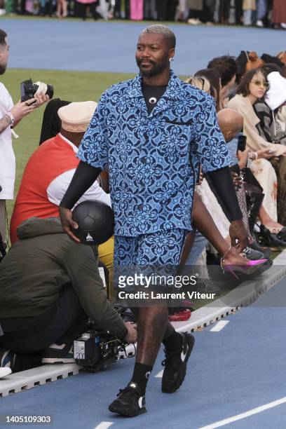 Footbaler Djibril Cissé walks the runway during the Marine Serre Menswear Spring Summer 2023 show as part of Paris Fashion Week on June 25, 2022 in...