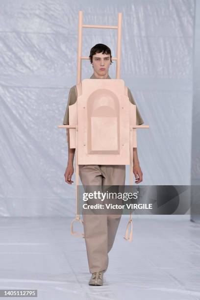 Model walks the runway during the Craig Green Ready to Wear Spring/Summer 2023 fashion show as part of the Paris Men Fashion Week on June 25, 2022 in...