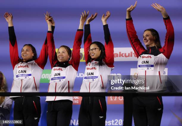 Bronze medalist, Kylie Masse, Rachel Nicol, Margaret MacNeil and Penny Oleksiak of Team Canada are seen on the podium after the Women's 4x100m Medley...