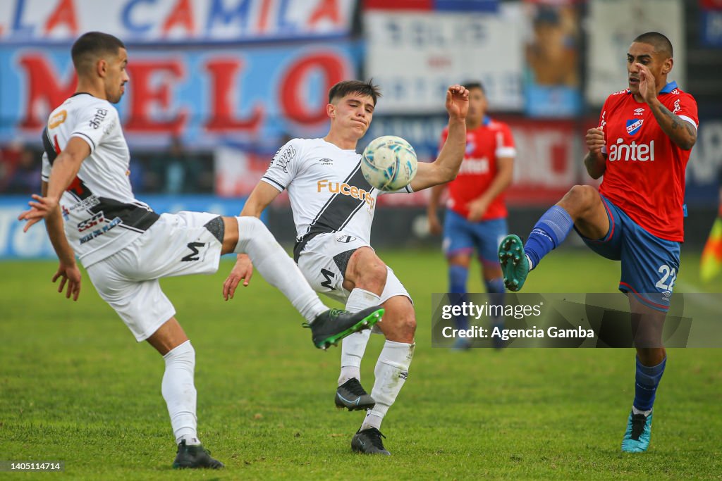 Emanuel Hernández and Rafael Haller of Danubio fight the ball against  News Photo - Getty Images