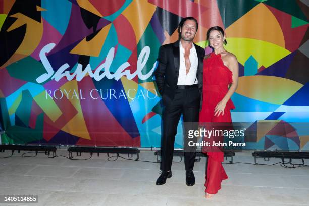 Dancing with The Stars Jenna Johnson in a stunning red jumpsuit and Val Chmerkovskiy attend the spectacular opening of Sandals Royal Curaçao Grand...