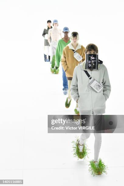 Model walks the runway during the Loewe Ready to Wear Spring/Summer 2023 fashion show as part of the Paris Men Fashion Week on June 25, 2022 in...