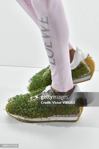 Model walks the runway during the Loewe Ready to Wear Spring/Summer 2023 fashion show as part of the Paris Men Fashion Week on June 25, 2022 in...