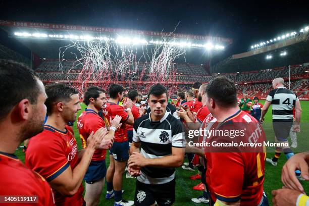 Spain players from a guard of honor to Sebastian Bezy of the Barbarians after the Spain v Barbarians match at El Molinon stadium on June 25, 2022 in...