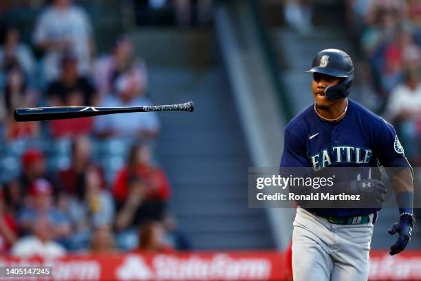 Julio Rodriguez of the Seattle Mariners hits a home run against the Los Angeles Angels in the first inning at Angel Stadium of Anaheim on June 25,...