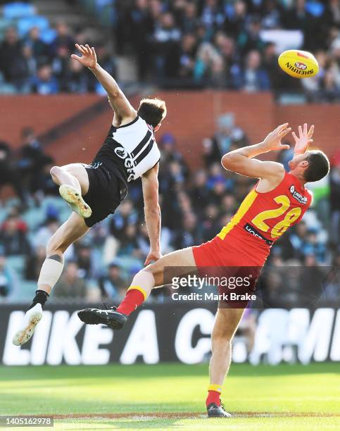 Jeremy Finlayson of Port Adelaide rucks against Jarrod Witts of the Suns during the round 15 AFL match between the Port Adelaide Power and the Gold...