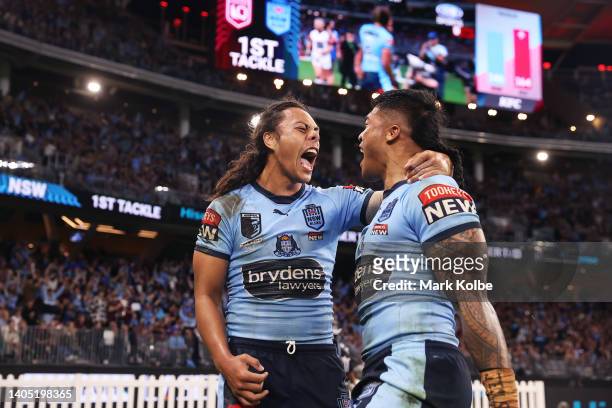 Brian To’o of the Blues celebrates with Jarome Luai after scoring a try during game two of the State of Origin series between New South Wales Blues...