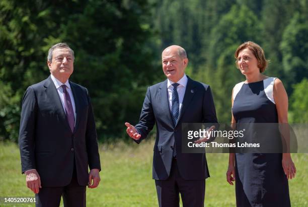 German Chancellor Olaf Scholz , his wife Britta Ernst and Italian Prime Minister Mario Draghi chat during a welcoming ceremony at Schloss Elmau on...