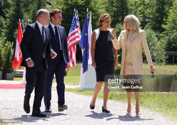 German Chancellor Olaf Scholz, French President Emmanuel Macron, Scholz's wife Britta Ernst and Macron's wife Brigitte Macron chat on the first day...