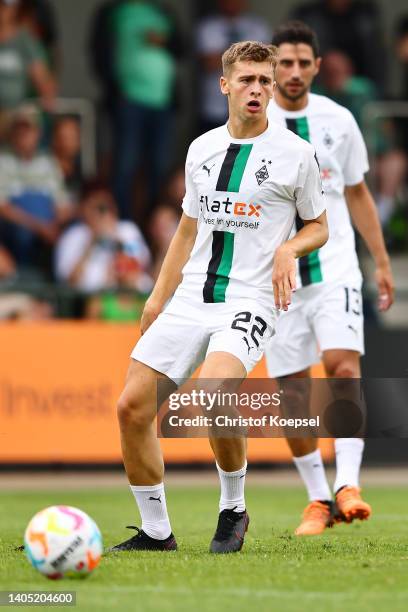 Oscar Fraulo of Moenchengladbach runs with the ball duirng a training session at Fohlenstadion on June 26, 2022 in Moenchengladbach, Germany....